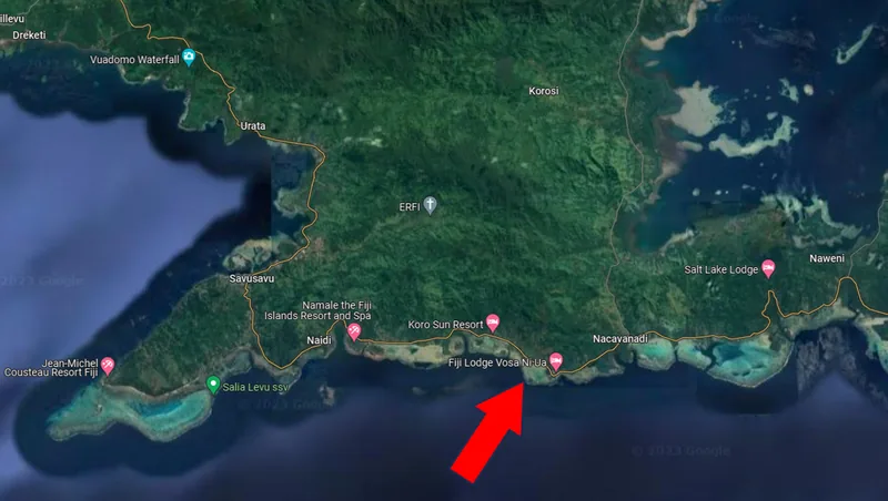 Satellite map of the Savusavu coast with an arrow marking the house area